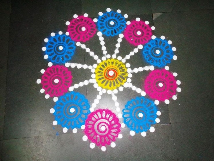How to make beautiful flowers in easy rangoli design - created by latest rangoli
