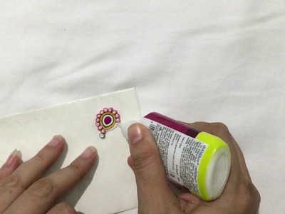 How to make ornamental quilling on an envelope by Vrinda Deshmukh