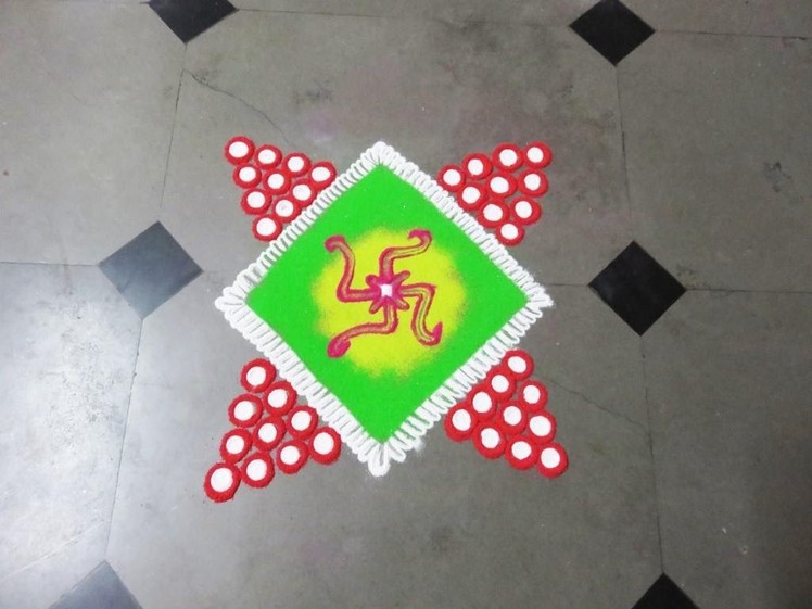 How to make swastik in square rangoli design   created by rangoli design