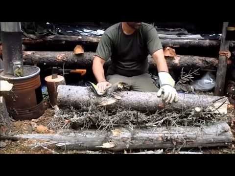 BUILDING A SURVIVAL SHELTER.HOW TO MAKE A LONG FIRE Alberta Backwoods Adventures episode 5