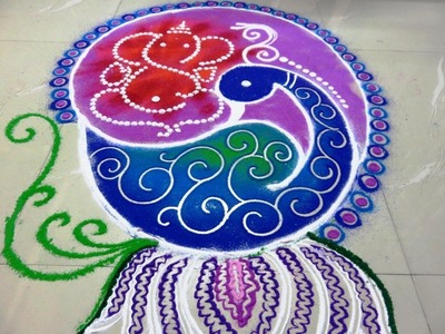 Diwali special peacock & ganesha rangoli design created by rangolidesigns
