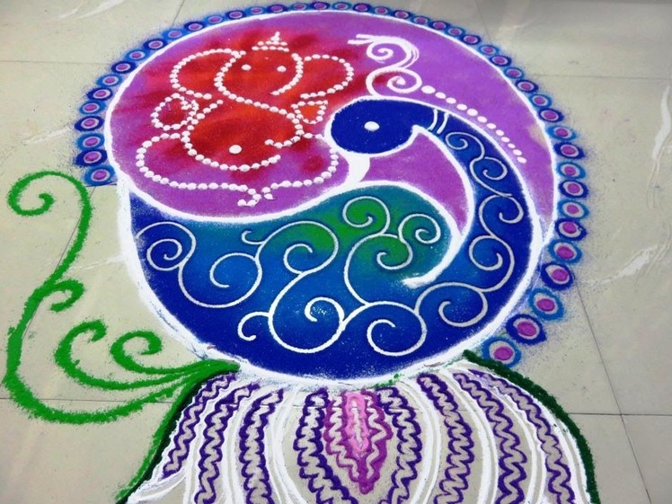 Diwali special peacock & ganesha rangoli design created by rangolidesigns
