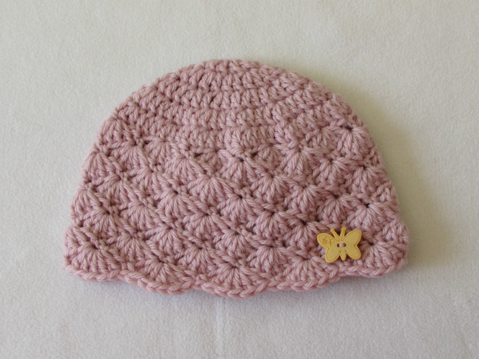 How to crochet a cute baby girl's hat for beginners