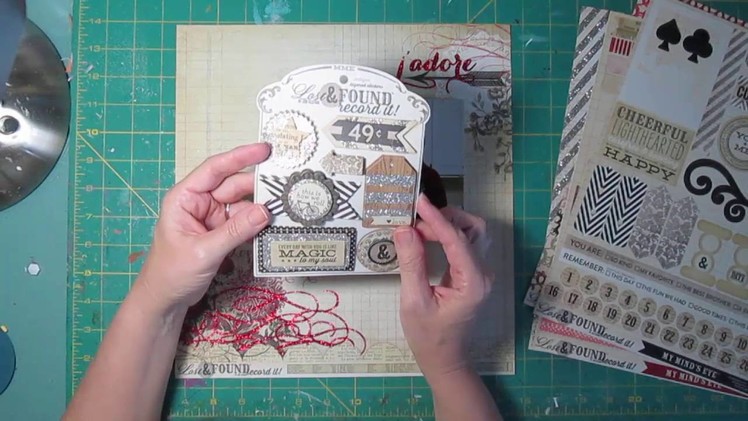 Scrapbooking Page Blending embellishments into Paper design