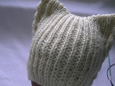 Hand-knitting of a hat with cat's ears.