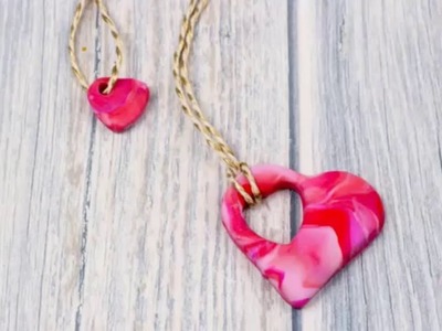 Polymer clay mother and child heart necklace
