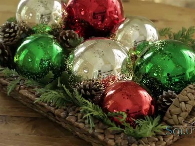 Twinkling Sphere hanging glass ornament sparkles with lights | Solutions.com