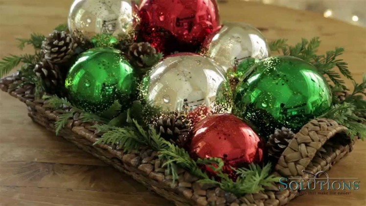 Twinkling Sphere hanging glass ornament sparkles with lights | Solutions.com