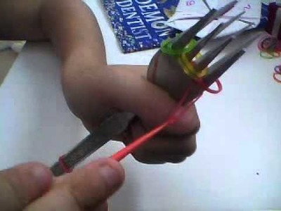 How to make a triple single loom band bracelet on 2 forks