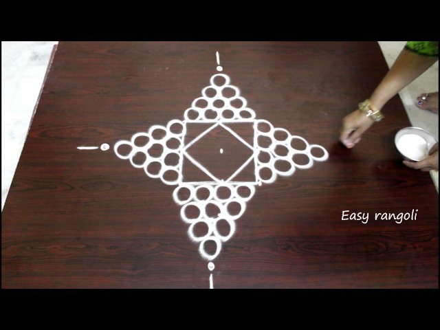 Rangoli designs for diwali with 5 to 1 straight dots- muggulu designs with dots- simple kolam