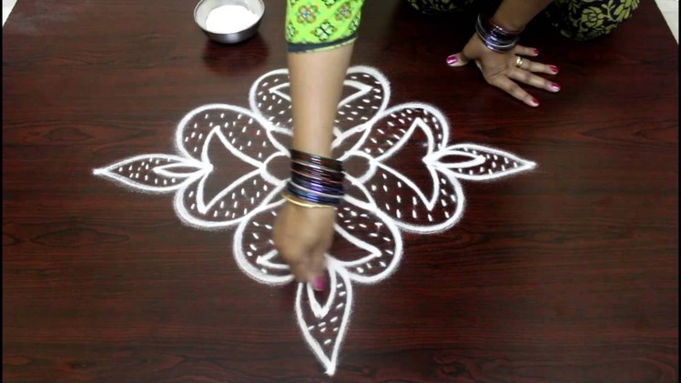 Deepam muggulu designs with 7 to 1 straight dots-kolam designs-muggulu designs-easy rangoi designs