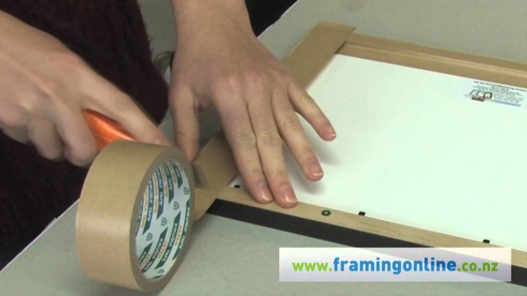 How To Frame A Picture: Taping The Back