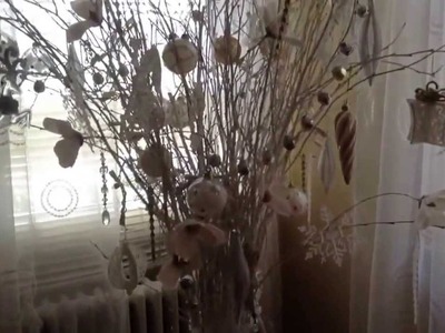 Decorating with tree branches and Christmas ornaments.by treasuresbybabyjen
