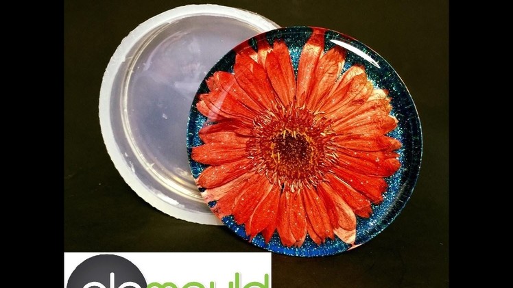 Casting Red Gerber flower into Alamould coaster mold. www.alamould.com