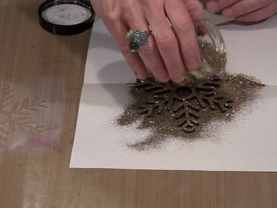 Creating Glittered Snowflake Holiday Ornaments by Joggles.com