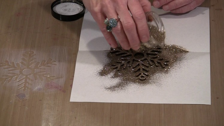 Creating Glittered Snowflake Holiday Ornaments by Joggles.com