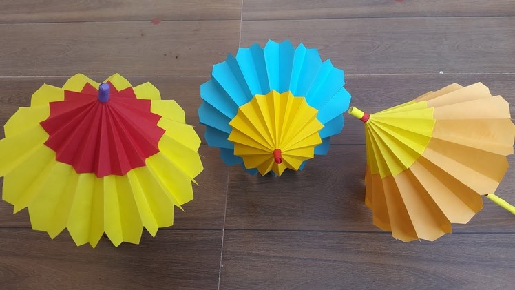 How to make an Origami paper umbrella that open and closes- Easy step by step process.