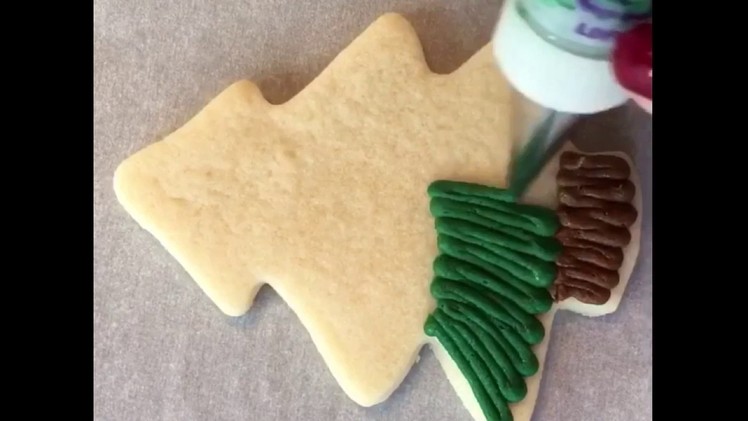 Christmas tree buttercream frosted cookie