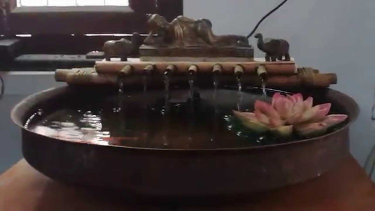 Sleeping buddha table top fountain.