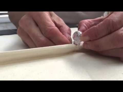 Sewing a breakaway device (orb) to a rod pocket