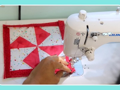 How to bind & hang a mini quilt tutorial by Crafty Gemini
