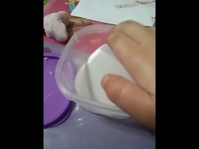 Making slime with paper plates and nail polish remover