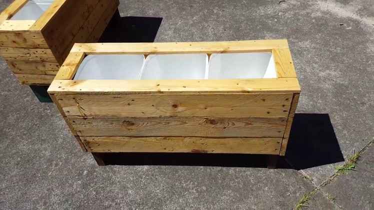 DIY recycled jug and pallet planters