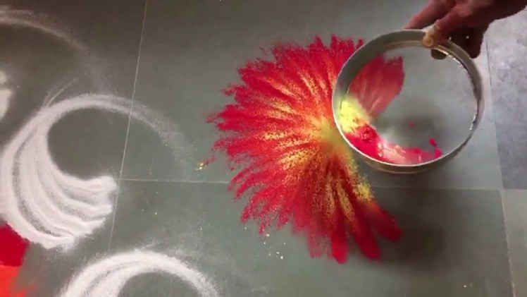 How to draw Rangoli with two colours at a time