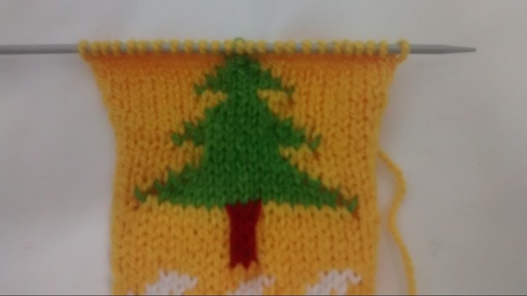 Multi color christmas  tree design in sweater in  hindi