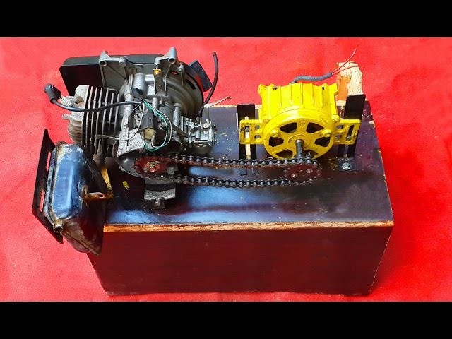 Homemade Dynamo Generator 220V Attached To Two Stroke Engine. DIY Free Electricity Dynamo Generator.