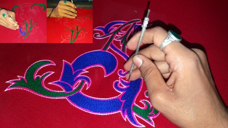 A S designing logo stitching by hand