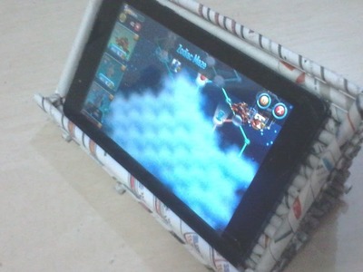 DIY: How to make tablet.smartphone stand using news paper rolls.tubes -  - best out of waste project