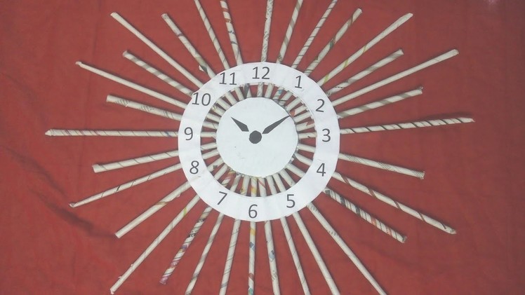 DIY: How to make wall clock with news paper tubes. rolls  - sun model - best out of waste craft