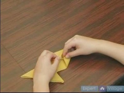 How to Fold Napkins : How to Make a Fish Fold in a Napkin