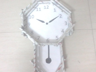 DIY: How to make pendulum wall clock using news paper rolls - best out of waste project