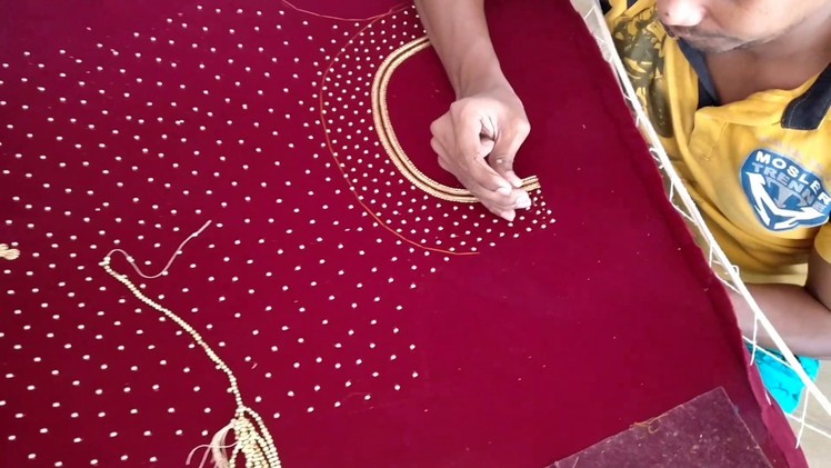 Zardosi bead work on red velvet gown