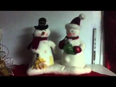 2 snowman singing, "We wish you a Merry Christmas"