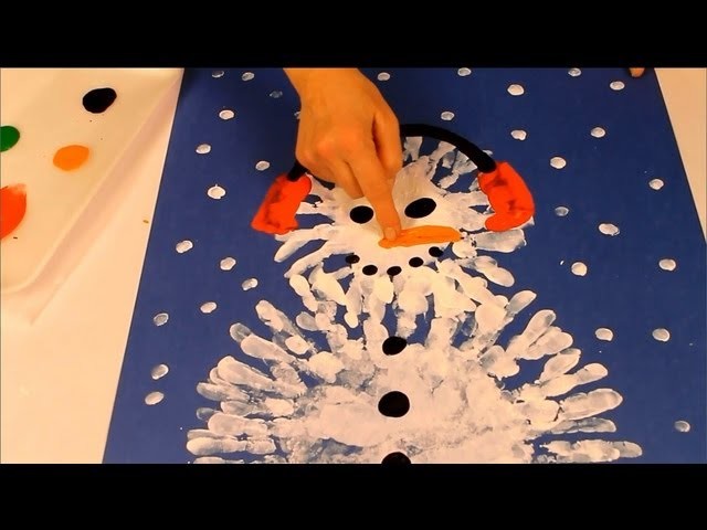 Finger painting a snowman