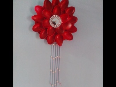 Plastic spoon  flower wall hanging.