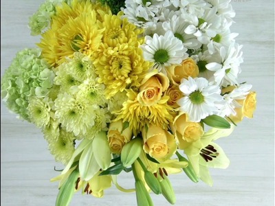 DIY: Try This Spring Flower Arrangement with Lilies, Daisies, Disbuds and More