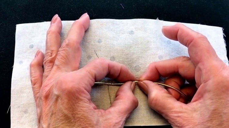 How to couch a gold braid.