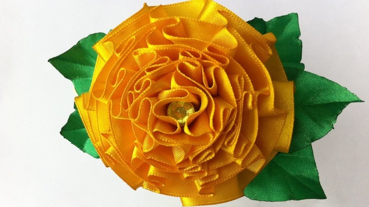 The decoration on the hairband Kanzashi. Flower Marigolds (Tagetes)