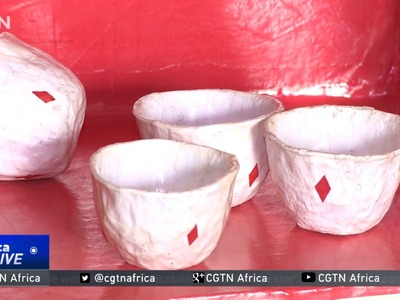 Ethiopian man turning recycled paper into furniture