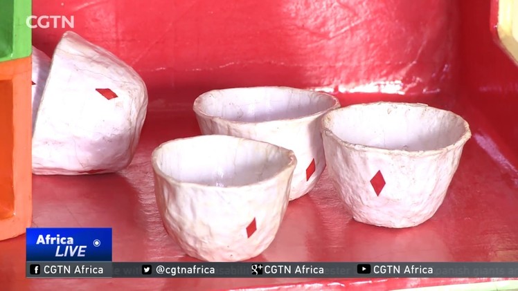 Ethiopian man turning recycled paper into furniture