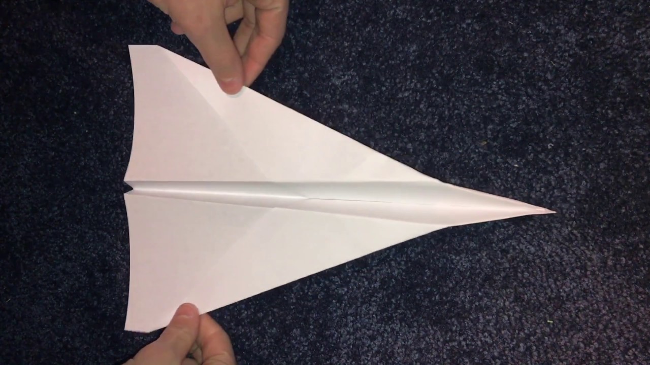 HOW TO MAKE A PAPER AIRPLANE IN LESS THEN 1 MINUTE! VERY EASY! AND FLIES FAR!!!