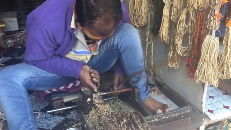 Hand crafting Tulsi Beads