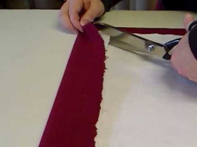 Adding loose interlining to a curtain with mitred corner