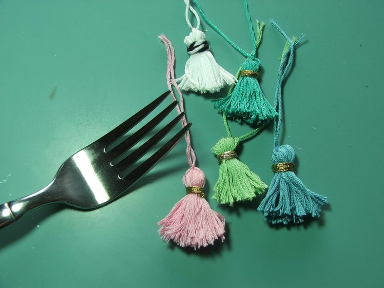 Tiny tassels made with a fork???? huh??