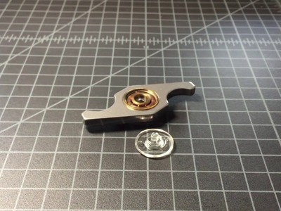 How to fix loose fidget spinner buttons