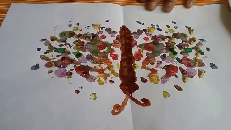 How to make a paper folding impression of a butterfly with water colours,fun watercolour painting fo